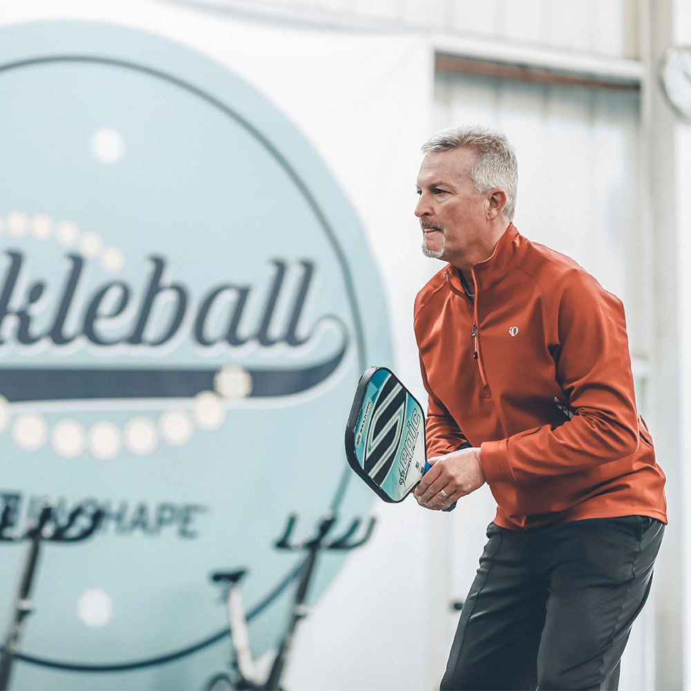 Man playing Pickleball